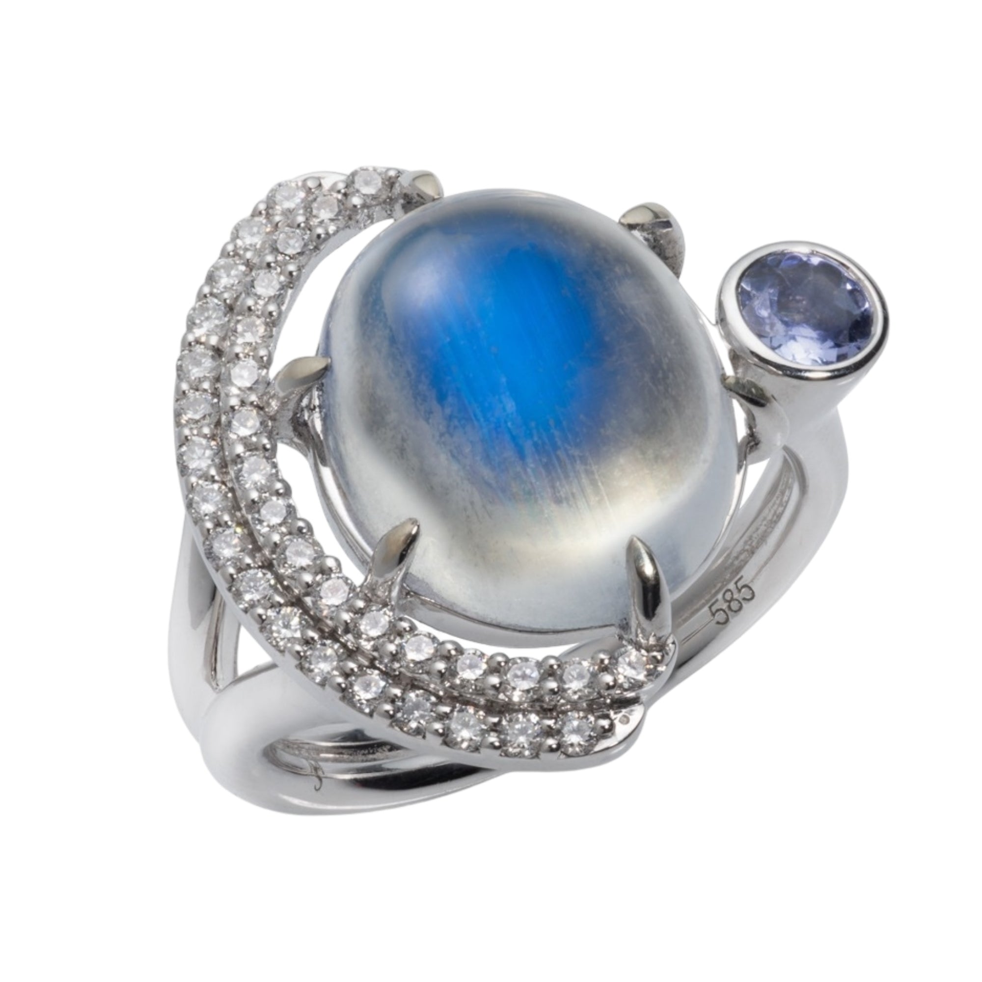 Eclipse Ring with Moonstone, Tanzanite and Diamonds 14k by Martha Seely available at Talisman Collection Fine Jewelers in El Dorado Hills, CA and online. Stats: This extraordinarily special cocktail ring showcases an 8.6 ct. blue moonstone cabochon stone set in 14k white gold. Floating around the &nbsp;Moonstone is 0.33 ct of diamonds and a 4mm pale tanzanite. You can almost see the sky as you gaze into the stone...