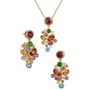 Supernova Necklace 14k by Martha Seely available at Talisman Collection Fine Jewelers in El Dorado Hills, CA and online. Stats: A colorful pendant comprised of 0.098 cts sparkling diamonds and 2.82 cts of multi-color gemstones (rhodolite, chrome diopside, pink sapphire, Swiss blue topaz, amethyst, spessartite and citrine) designed to make your day feel like an explosion of joy! The vibrant 14k pendant measures 1.18” L x 0.6” W and hangs from an 18" chain.