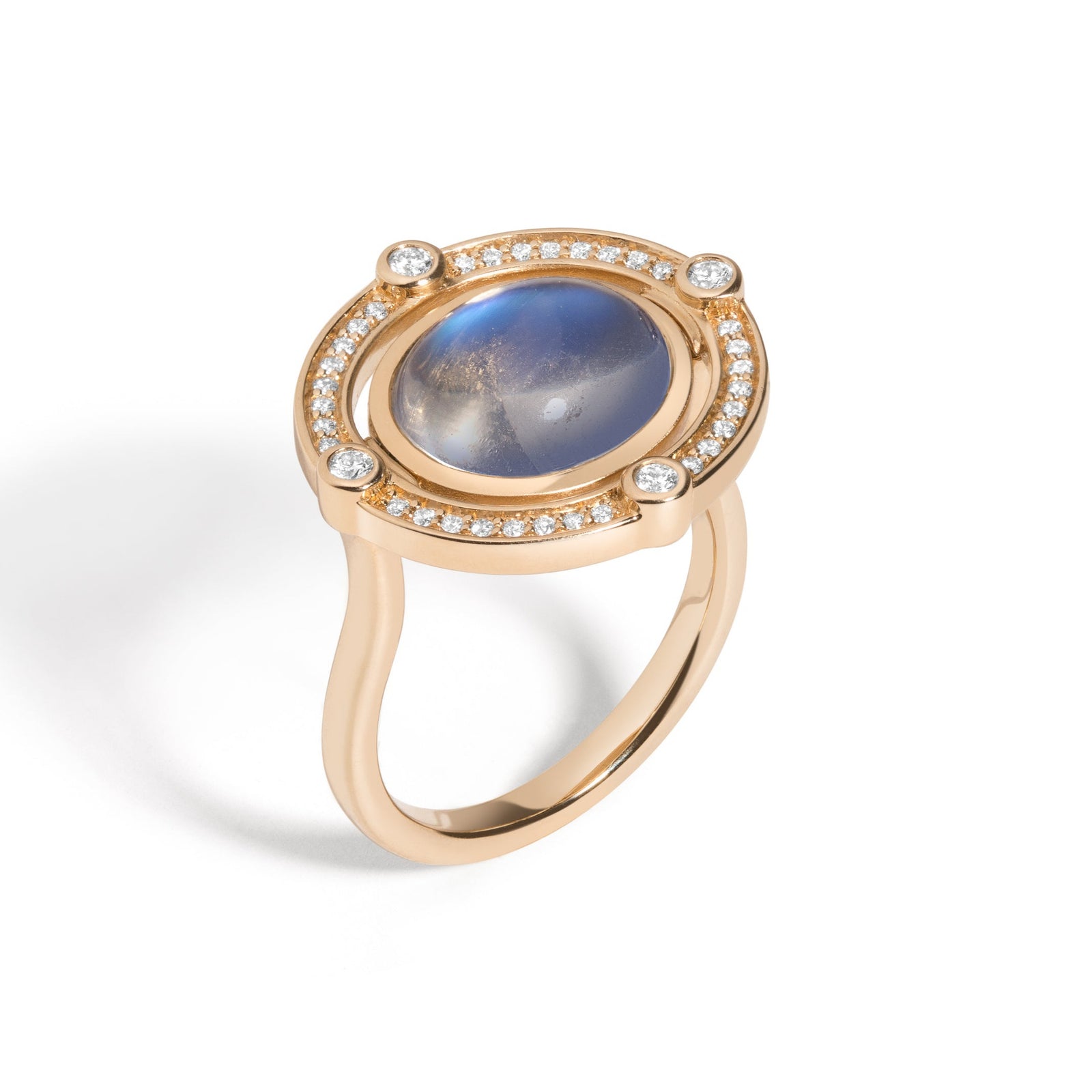 Compass Reverse Ring by Mined + Foundavailable at Talisman Collection Fine Jewelers in El Dorado Hills, CA and online.  A change of direction can be a very good thing, and the Compass ring illustrates just that. With one quick twist, the center flips from glowing 5.75ct moonstone to smooth, satiny 14k gold, engraved with a design inspired by an antique compass rose motif. A ring of sparkling pavé diamonds  and four bezel set diamonds totaling 0.31cts -representative of the four cardinal directions- complete