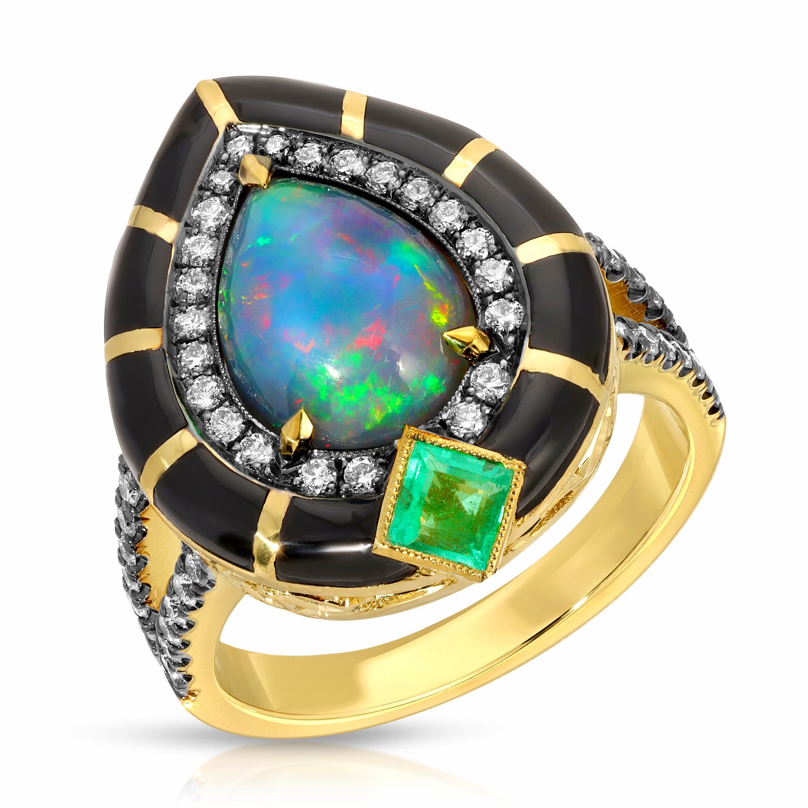 Opal & Emerald Enamel Ring by Lord Jewelry available at Talisman Collection Fine Jewelers in El Dorado Hills, CA and online. Behold the captivating Opal & Emerald Enamel Ring, a true testament to art deco elegance. Handcrafted in radiant 18k gold and sleek black enamel, this ring showcases a spectacular 1.58 ct pear-cut opal, .44 cts of diamonds, and a .35 carat emerald. Its vintage-inspired design exudes timeless charm and sophistication.