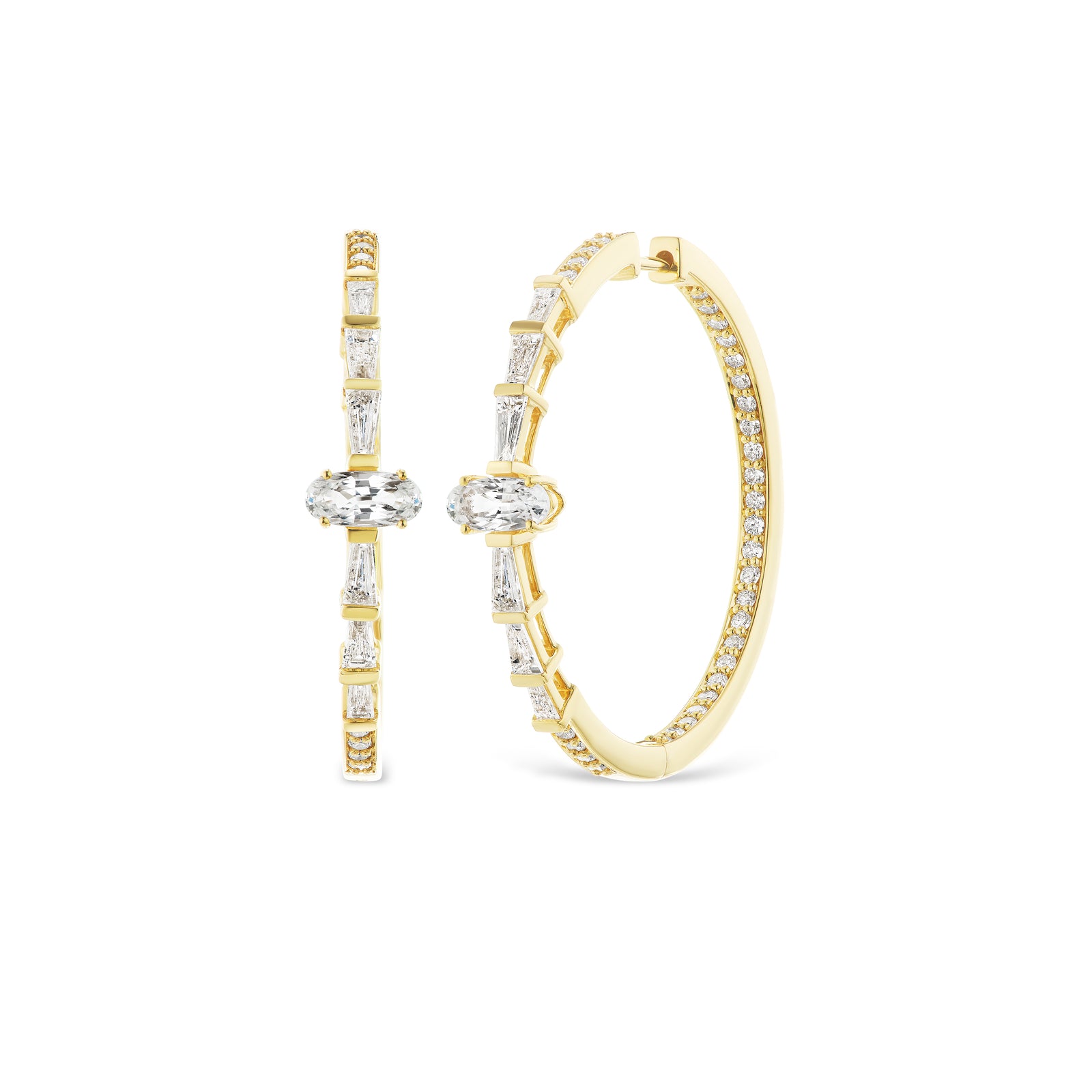 Gamma Ray Hoop Earrings by Meredith Young available at Talisman Collection Fine Jewelers in El Dorado Hills, CA and online. Perfect for everyday, the Gamma Ray Hoop Earrings, crafted in 18K gold and adorned with 1.3 carats of diamonds add a touch of radiance. Wear them to sparkle like the stars and make every moment shine.