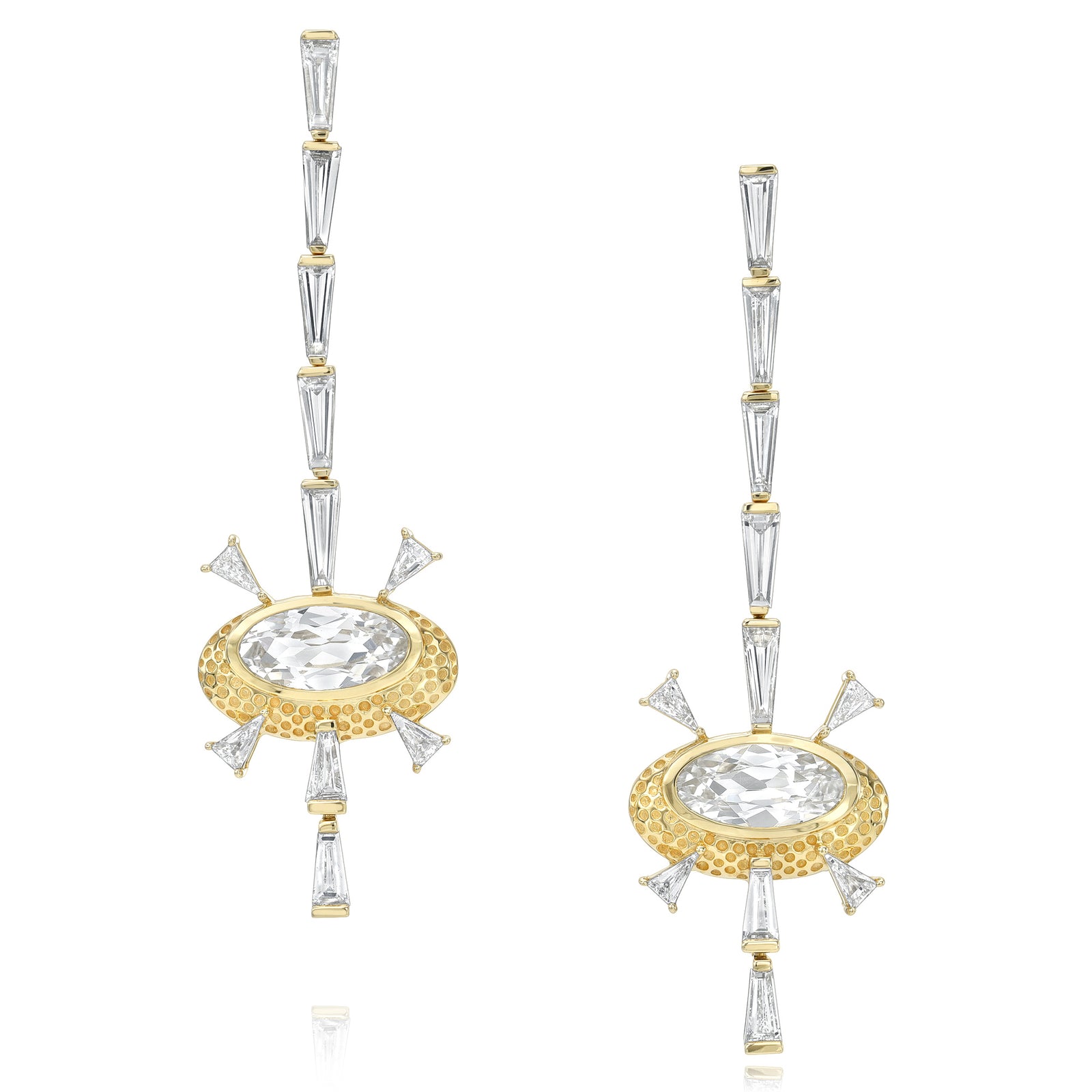 Supernova Hinged Earrings by Meredith Young available at Talisman Collection Fine Jewelers in El Dorado Hills, CA and online. These statement-making earrings are out of this world! Their celestial inspired design features 1.72 carats of tapered baguette diamonds arranged in a striking linear pattern, beautifully intersecting with 0.95 carats of oval-cut white sapphires surrounded by 18k gold. Finished with a classic post back, these earrings are as comfortable as they are spectacular.