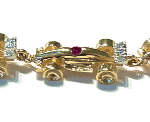 Gold Formula One Race Car Bracelet with Rubies and Diamonds