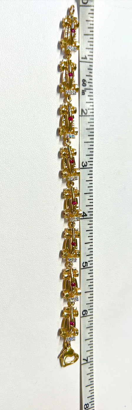 Gold Formula One Race Car Bracelet with Rubies and Diamonds