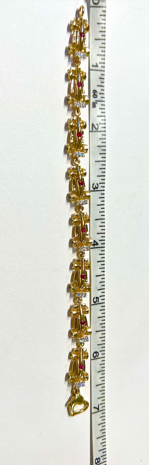 Gold Formula One Race Car Bracelet with Rubies and Diamonds