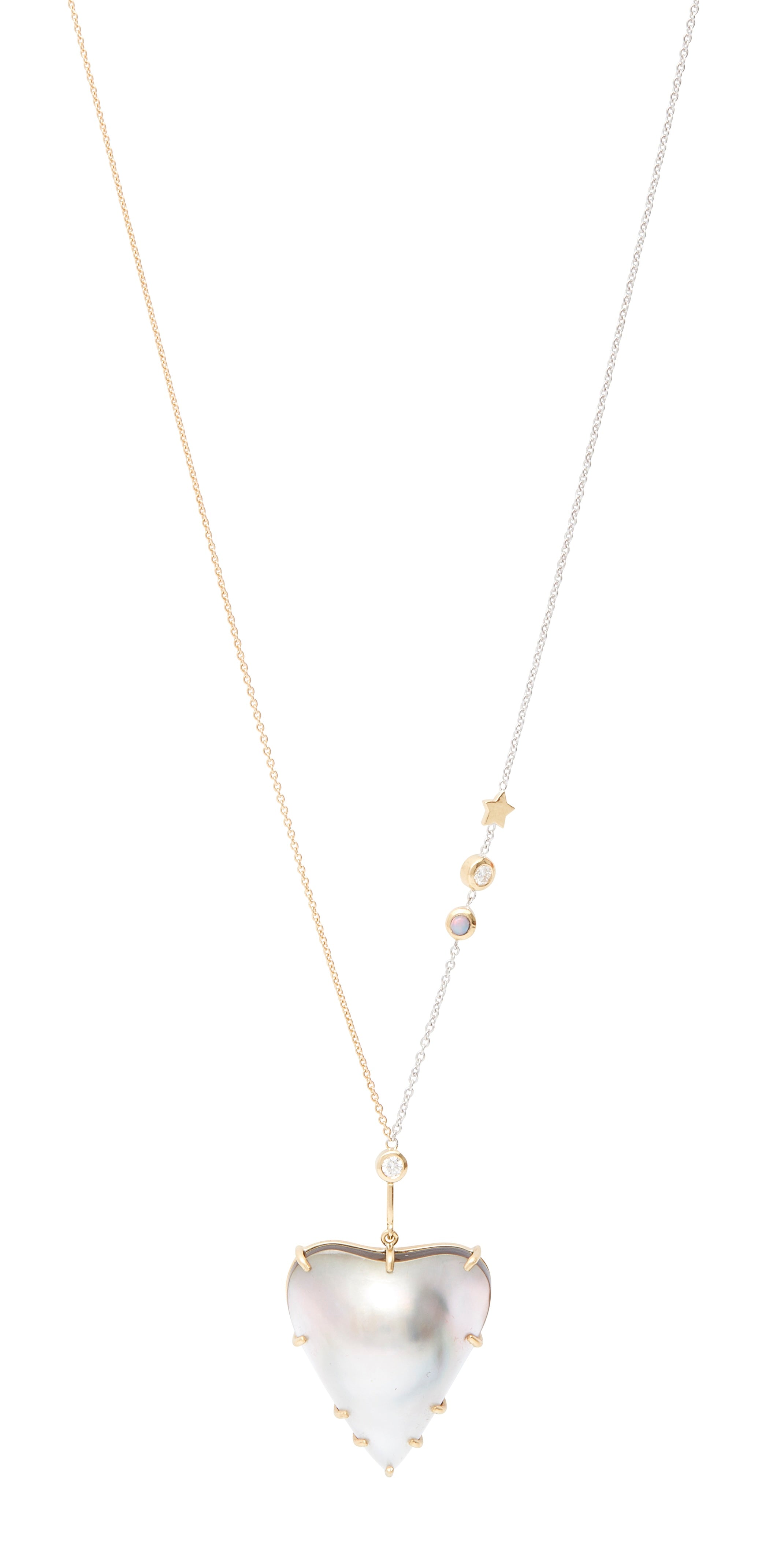 Beam Mabe Pearl Necklace by Unhada available at Talisman Collection Fine Jewelers in El Dorado Hills, CA and online. The Beam Necklace showcases a heart-shaped mabe pearl, set against a two-tone chain that’s asymmetrically embellished with a bezel-set opal, a diamond, and a tiny gold star. Crafted from 18k gold and sterling silver, this one-of-a-kind creation features an adjustable length of 18-22” and is secured with a lobster clasp. Its distinctive design and exceptional craftsmanship make it a truly uniq