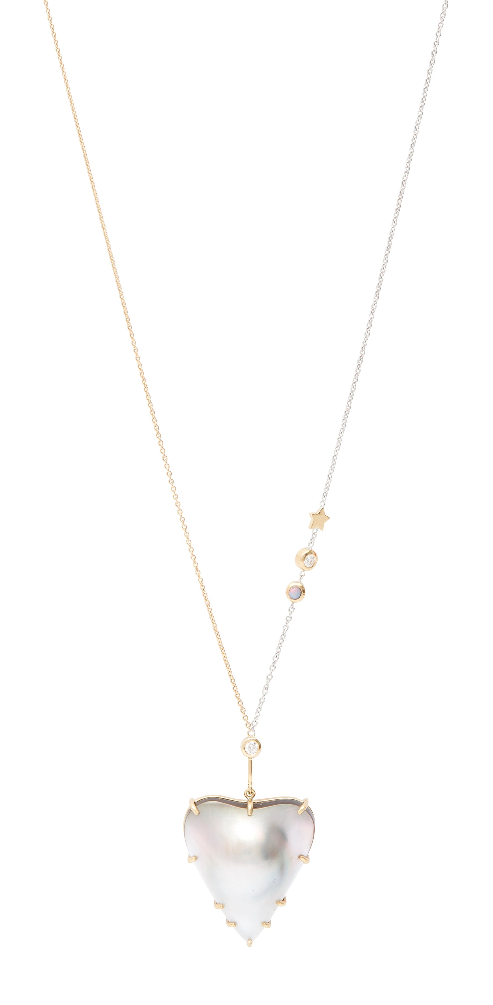 Beam Mabe Pearl Necklace by Unhada available at Talisman Collection Fine Jewelers in El Dorado Hills, CA and online. The Beam Necklace showcases a heart-shaped mabe pearl, set against a two-tone chain that’s asymmetrically embellished with a bezel-set opal, a diamond, and a tiny gold star. Crafted from 18k gold and sterling silver, this one-of-a-kind creation features an adjustable length of 18-22” and is secured with a lobster clasp. Its distinctive design and exceptional craftsmanship make it a truly uniq
