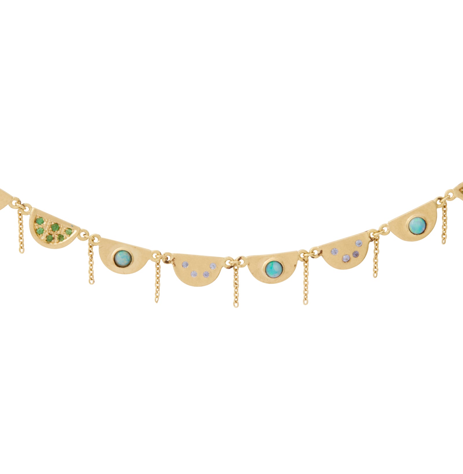 Tsavorite Chantal Necklace by Unhada available at Talisman Collection Fine Jewelers in El Dorado Hills, CA and online.The Chantal necklace brings a touch of je ne sais quoi to your daily ensemble. The intricate scalloped design exudes elegance and grace; it's gorgeous on its own, and even more stunning when combined with other necklaces! This 18k gold piece features dazzling Tsavorite (.09 cts), opals, and sapphires (.10 cts). 