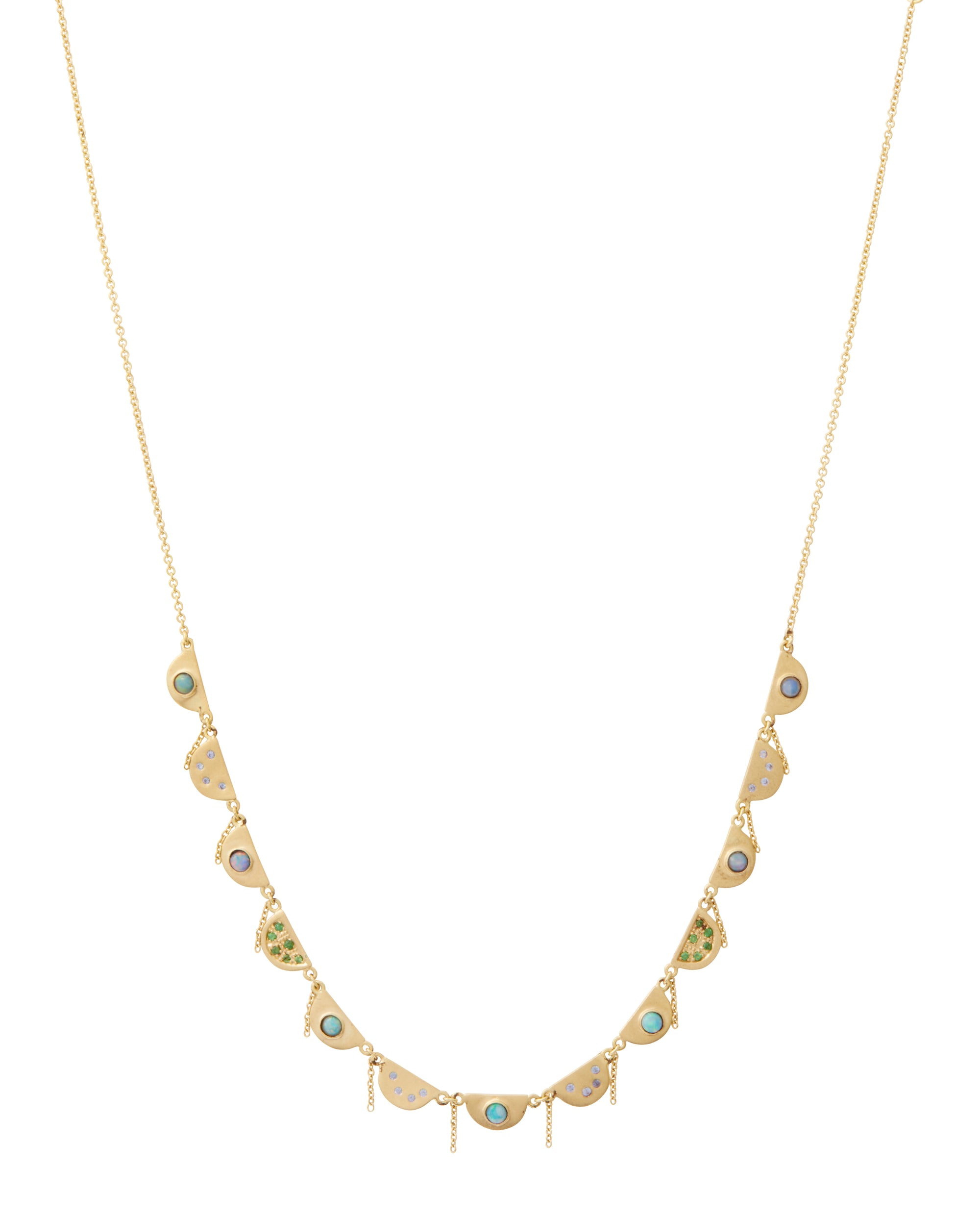 Tsavorite Chantal Necklace by Unhada available at Talisman Collection Fine Jewelers in El Dorado Hills, CA and online.The Chantal necklace brings a touch of je ne sais quoi to your daily ensemble. The intricate scalloped design exudes elegance and grace; it's gorgeous on its own, and even more stunning when combined with other necklaces! This 18k gold piece features dazzling Tsavorite (.09 cts), opals, and sapphires (.10 cts). 