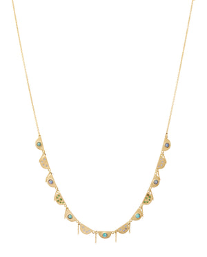 Tsavorite Chantal Necklace by Unhada available at Talisman Collection Fine Jewelers in El Dorado Hills, CA and online.The Chantal necklace brings a touch of je ne sais quoi to your daily ensemble. The intricate scalloped design exudes elegance and grace; it's gorgeous on its own, and even more stunning when combined with other necklaces! This 18k gold piece features dazzling Tsavorite (.09 cts), opals, and sapphires (.10 cts). 
