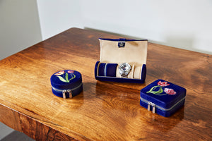 Royal Asscher Round  Jewelry Zip Case by Wolf available at Talisman Collection Fine Jewelers in El Dorado Hills, CA and online. Royal Asscher Diamond Company Square Jewellery Zip Case features deep blue velvet with elaborate tulip embroidery exterior, mirror, storage and hidden necklace hook section to organise your jewellery in style. Includes LusterLoc™ anti-tarnish lining and silver finish zip and details.