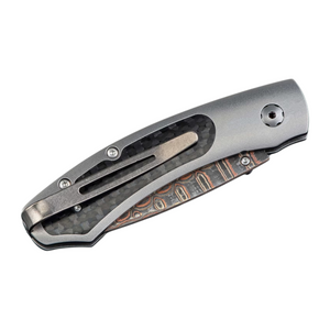 Copper Damascus 'Fervor' Pocket Knife by William Henry available at Talisman Collection Fine Jewelers in El Dorado Hills, CA and online. 