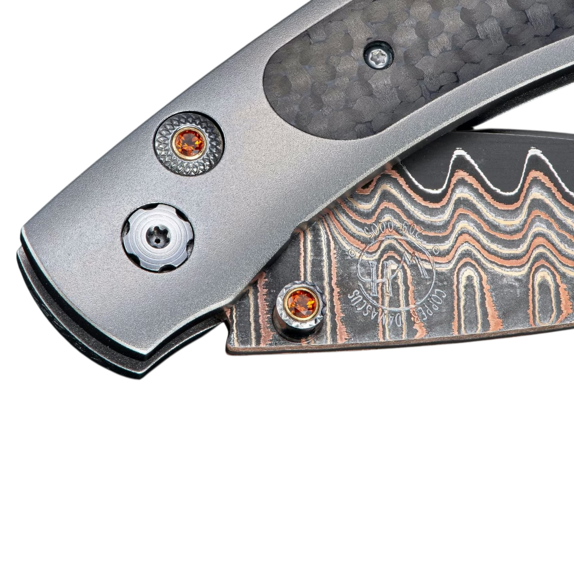 Copper Damascus 'Fervor' Pocket Knife by William Henry available at Talisman Collection Fine Jewelers in El Dorado Hills, CA and online. 