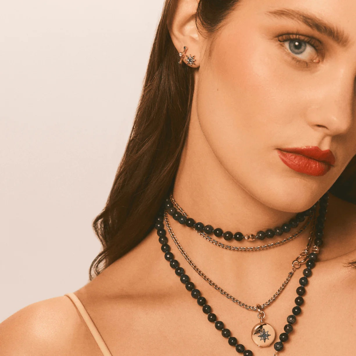 Crossroad Diamond Stud by Mined + Found available at Talisman Collection Fine Jewelers in El Dorado Hills, CA and online. Representative of a segment in time, the Diamond Crossroad Studs may be worn with the diamond positioned close to either end cap, or centered in the middle. With 0.27 cts of diamond, these 14k yellow gold earrings make a delicate statement for a primary piercing, and are so streamlined that they're easily worn in secondary and cartilage piercings as well. 