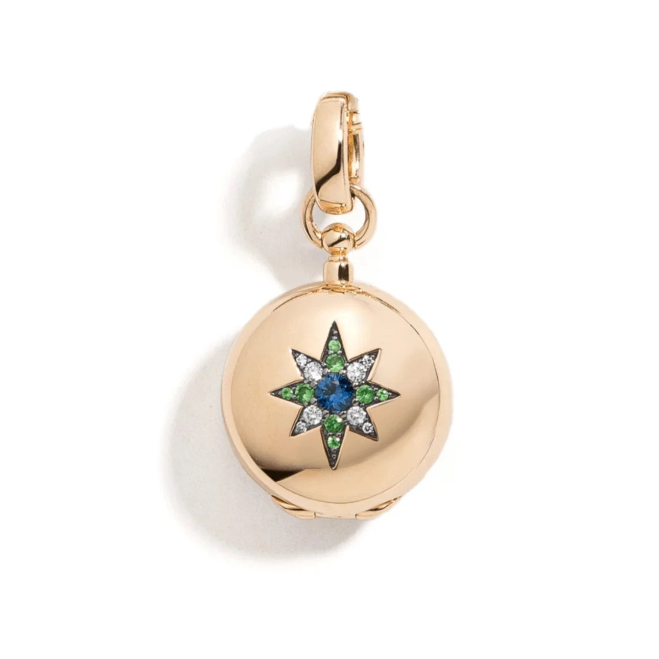 Direction Sapphire and Tsavorite Locket by Mined + Found available at Talisman Collection Fine Jewelers in El Dorado Hills, CA and online. Useful Objects&nbsp;are designed to captivate the eye, touch the heart, spark conversation and provide meaningful adornment; this spectacular locket is a beautiful example. From inside the 14k locket emerges a coin in smooth, satin finish yellow gold. On the one side, a sunburst dictates "GO FOR IT." The reverse, a serene moonscape, with the message "WAIT FOR IT." The ex