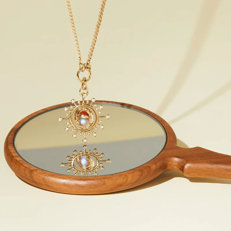 Eightfold Chain by Mined + Found available at Talisman Collection Fine Jewelers in El Dorado Hills, CA and online.  A modern masterpiece infused with vintage inspiration, the Eightfold chain weaves the beauty of the past with the enduring elegance of the present. Each link is meticulously formed, radiating the timeless allure of warm, 14k yellow gold and the piece is finished with a rainbow gemstone embellished clasp. The 18" chain length is perfect paired with pendants or worn alone for a subtle glow. 