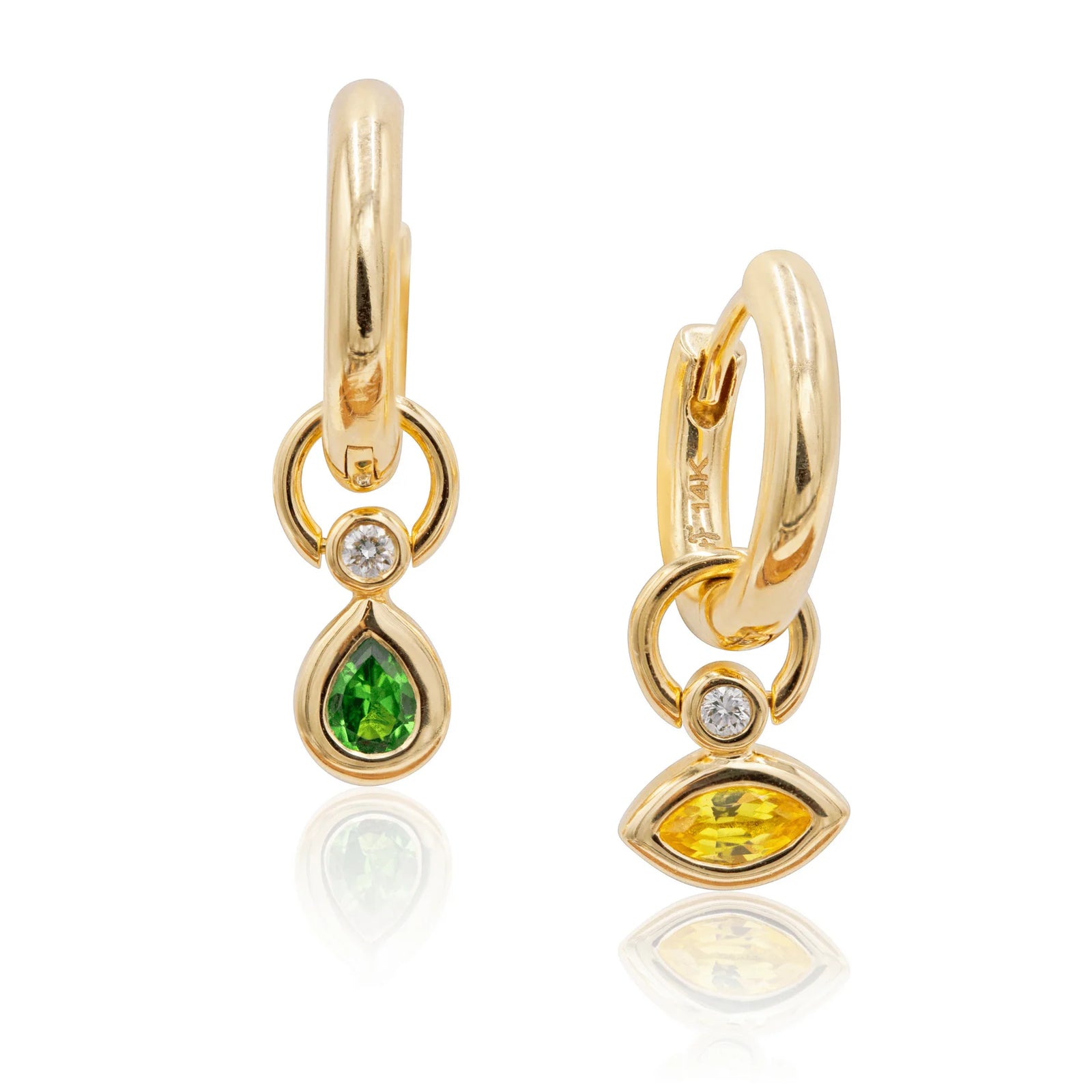 Gold Mini Hoops by Mined + Found available at Talisman Collection Fine Jewelers in El Dorado Hills, CA and online. Perfect little 14k hoop earrings perfectly hug the ear while leaving just enough room for the company of one of our gemstone charms. Hinged base design. Diameter .47".