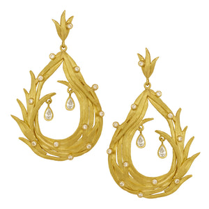 Ribbons Teardrop Diamond Earrings by Laurie Kaiser available at Talisman Collection Fine Jewelers in El Dorado Hills, CA and online. The perfect addition to your jewelry collection, the Ribbons Teardrop Diamond Earrings in 18k yellow gold are a vivacious pair of statement earrings. With intertwining leaves and a total of 0.93 cts of sparkling white brilliant diamonds, these earrings are truly eye-catching.