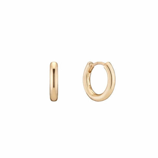 Gold Mini Hoops by Mined + Found available at Talisman Collection Fine Jewelers in El Dorado Hills, CA and online. Perfect little 14k hoop earrings perfectly hug the ear while leaving just enough room for the company of one of our gemstone charms. Hinged base design. Diameter .47".