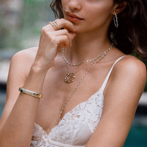 Long Moonstone Chain by Penny Preville available at Talisman Collection Fine Jewelers in El Dorado Hills, CA and online. 24 carats of pure magic! A remarkable 24 cts of luminous round moonstones, set in luxurious 18k gold bezels adorn this 34" chain necklace. 