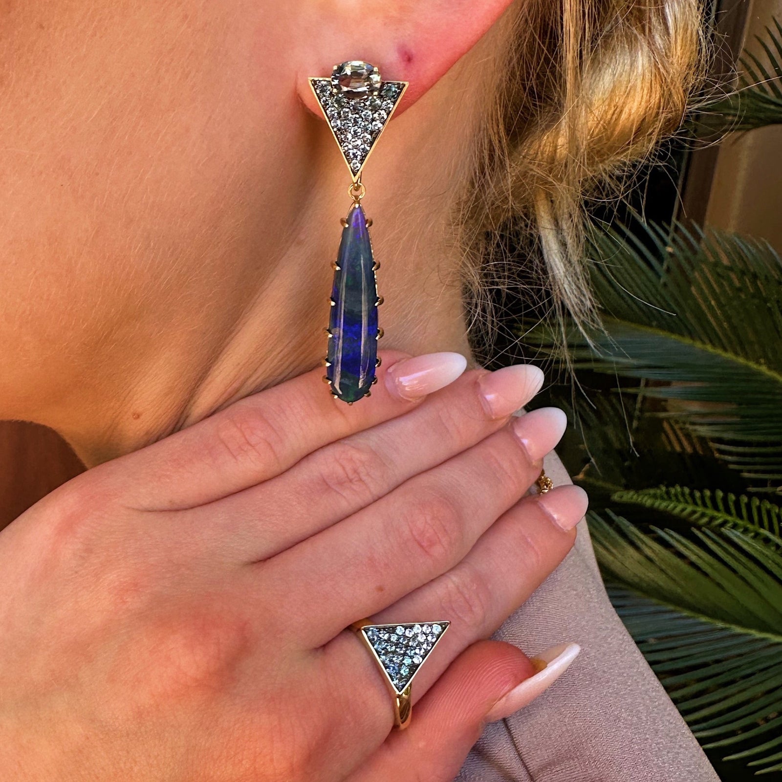 Orion's Pave Triangle Ring by Meredith Young available at Talisman Collection Fine Jewelers in El Dorado Hills, CA and online. Like constellations in the night sky, Orion's Pave Triangle Ring beckons with its enchanting .2 carat denim blue spinels and a dynamic .3 carat color-change garnets. Fashioned from 18K yellow gold, this ring offers a modern twist on celestial beauty. 