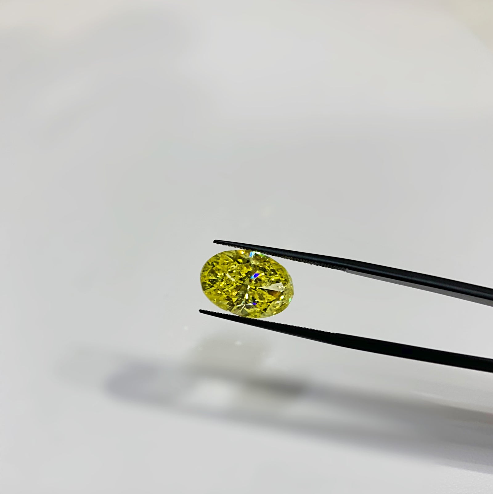 6.18 Carat Oval, Fancy Yellow, Color and Clarity Enhanced Diamond - Talisman Collection Fine Jewelers