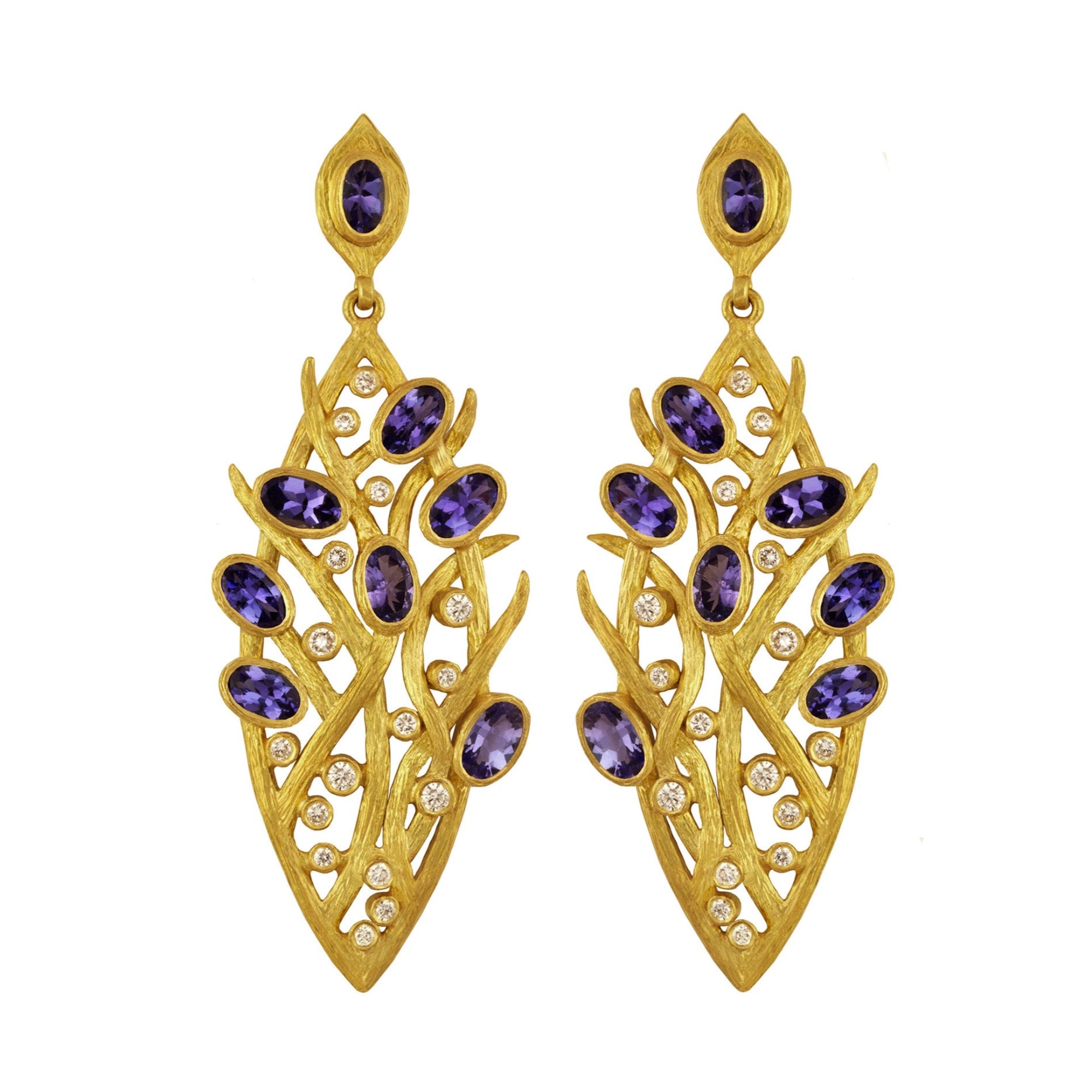 Tanzanite Lemongrass Marquis Earrings by Laurie Kaiser available at Talisman Collection Fine Jewelers in El Dorado Hills, CA and online. Lavished with multiple tanzanite stones and 0.49 cts of white brilliant diamonds set in 18k yellow gold, these earrings are the epitome of luxury. Classic post backs ensure they will sit beautifully on your ear. 