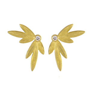 Diamond 18k Petal Stud Earrings by Laurie Kaiser available at Talisman Collection Fine Jewelers in El Dorado Hills, CA and online. Introducing our exquisite 18k yellow gold earrings featuring delicate petals that elegantly surround a sparkling 0.08 carat white brilliant diamond center. The classic post backs ensure comfortable wear all day long, making them the perfect for every day. These earrings are a true testament to the beauty of nature and are sure to leave a lasting impression.