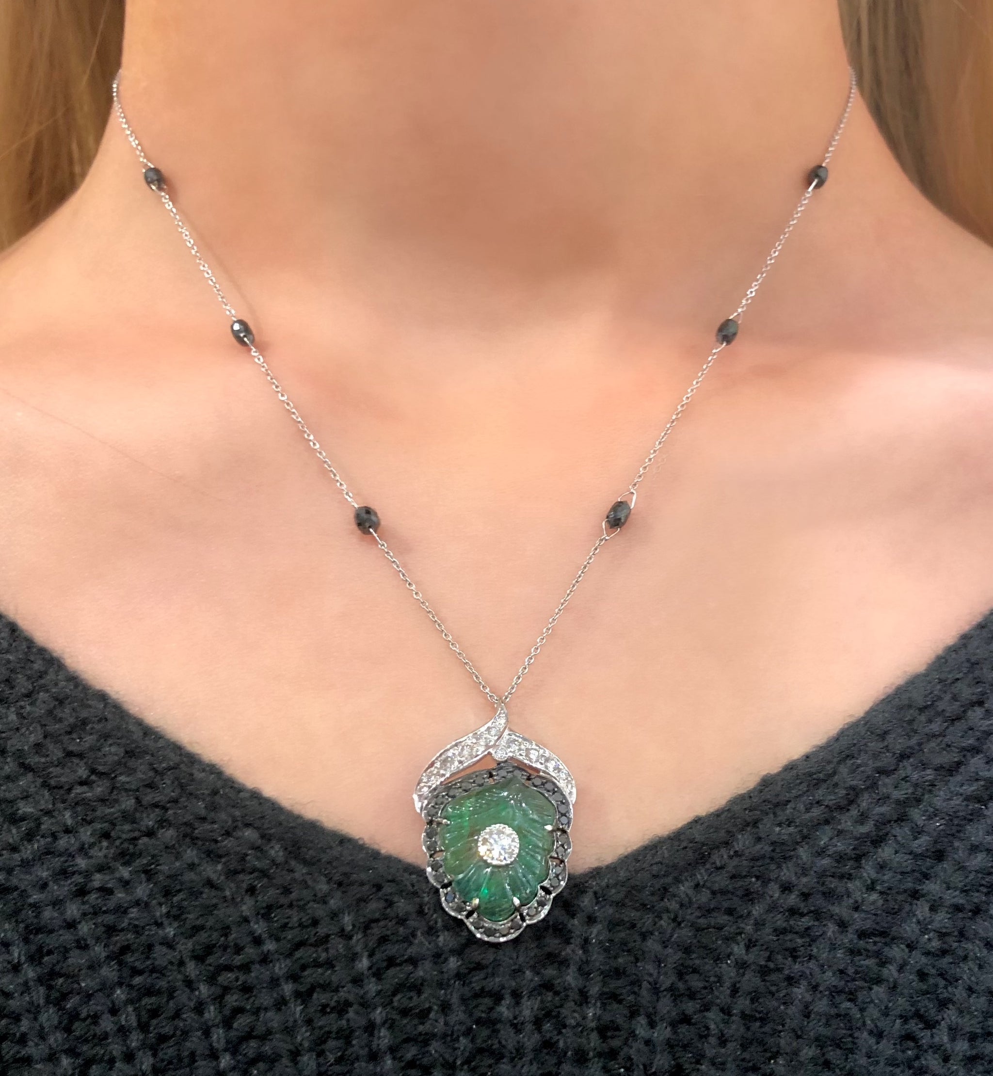 Carved emerald pendant hotsell