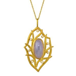 Lemongrass Lavender Chalcedony Necklace by Laurie Kaiser available at Talisman Collection Fine Jewelers in El Dorado Hills, CA and online. Features a cabochon oval lavender chalcedony at its center and is surrounded by 18 karat gold and accented with 0.11 carats of white diamonds. The delicate 18" chain is the perfect length to complement your décolletage. 