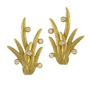 Diamond Climbing Vine Earrings by Laurie Kaiser available at Talisman Collection Fine Jewelers in El Dorado Hills, CA and online. Elevate your look with these exquisitely crafted 18k yellow gold vine earrings. Delicate buds of white, brilliant diamonds totaling 0.10 cts adorn the vines, adding an extra touch of luxury. Featuring classic post backs, these earrings are as comfortable as they are stunning.