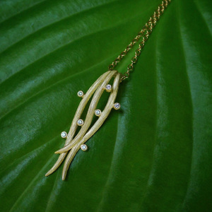 Diamond Triple Vine Necklace by Laurie Kaiser available at Talisman Collection Fine Jewelers in El Dorado Hills, CA and online. Crafted in 18k yellow gold, this 18" necklace features a pendant comprised of three delicate vines adorned with white brilliant diamonds, totaling 0.07 carats and is perfect for everyday wear.