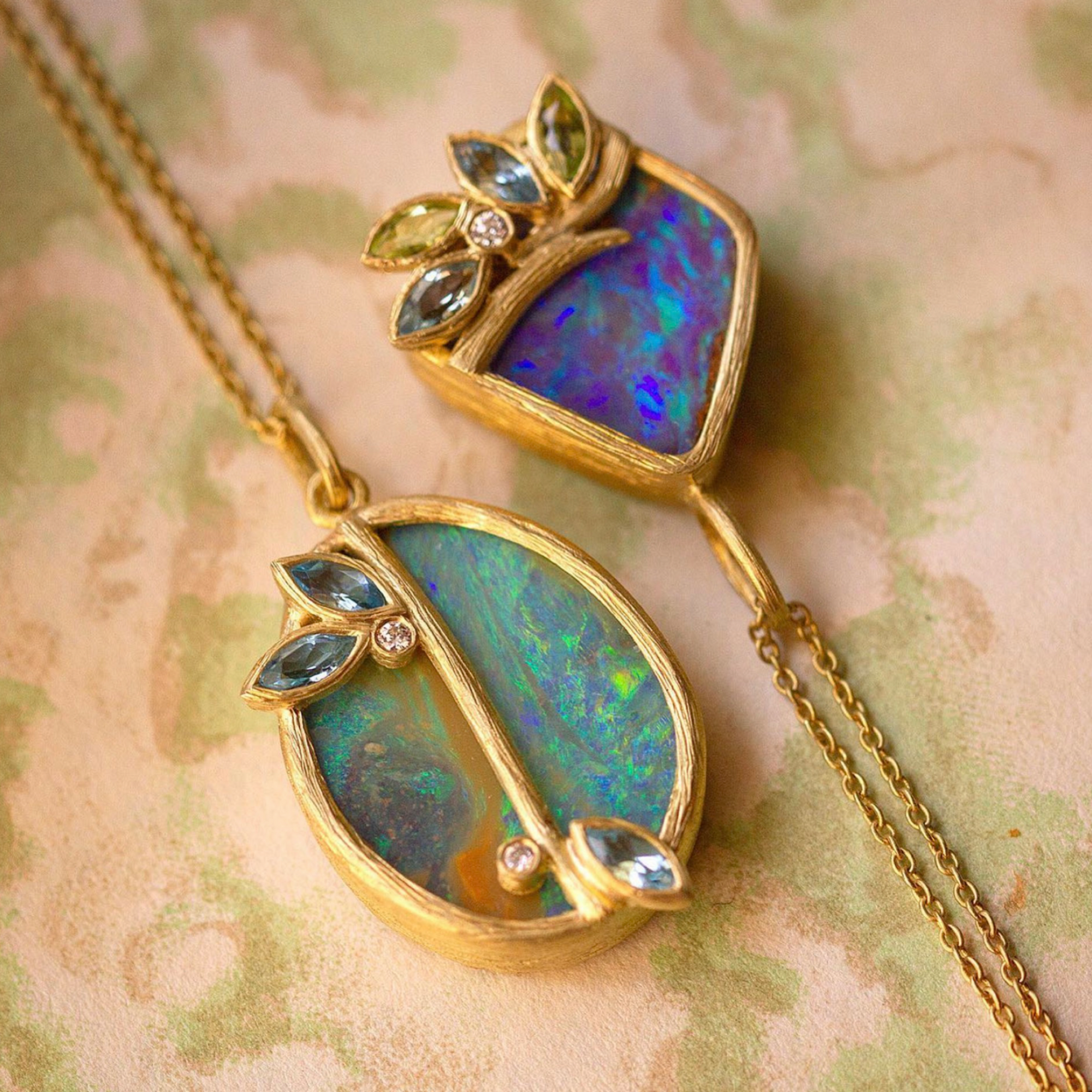 Petal Opal Necklace by Laurie Kaiser available at Talisman Collection Fine Jewelers in El Dorado Hills, CA and online. A one-of-a-kind piece crafted with a boulder opal set in an 18k gold frame. This special necklace is accentuated with peridot, Swiss blue topaz, and white diamonds and measures 17" long. It truly makes a statement without saying a word.