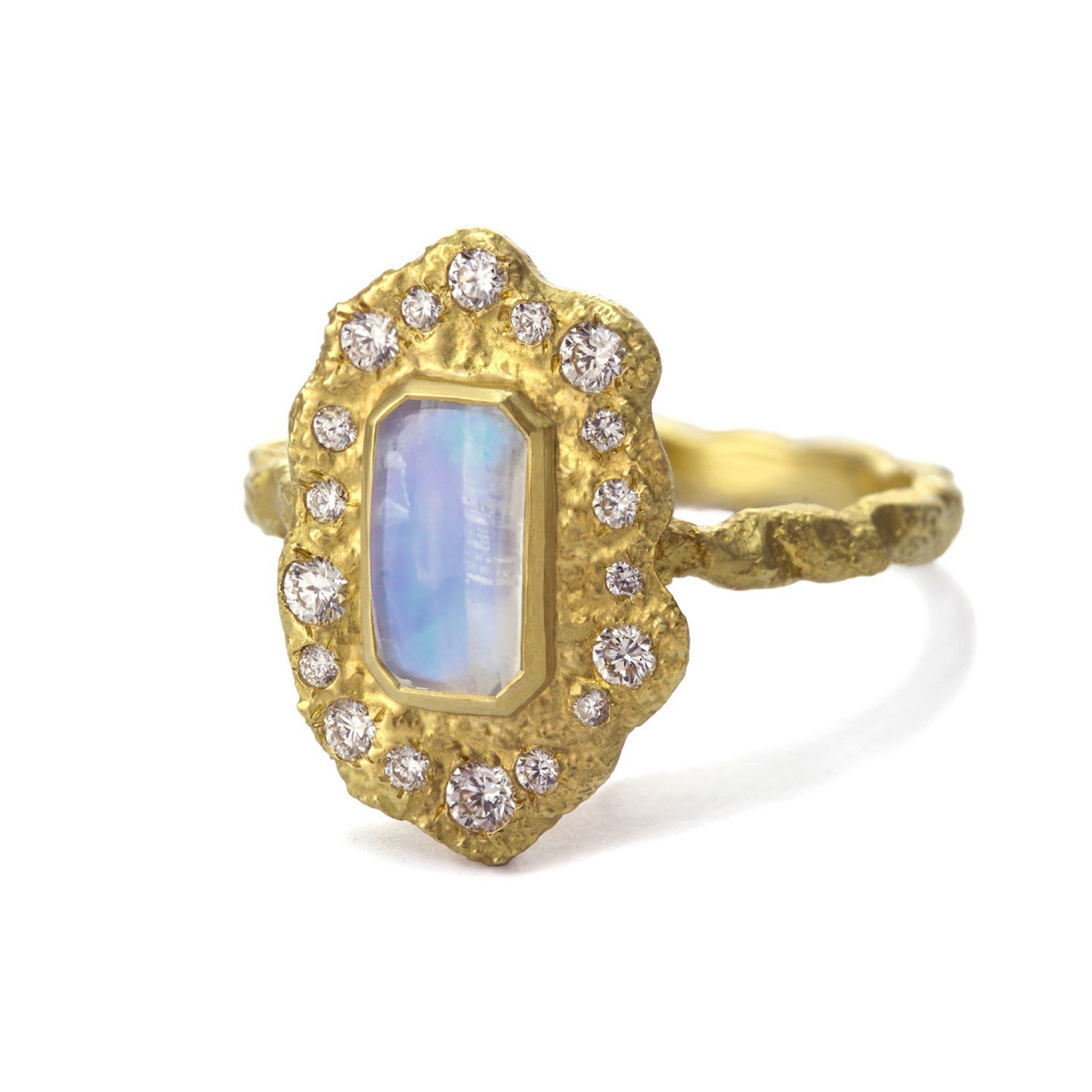Rustic Moonstone Ring by Laurie Kaiser available at Talisman Collection Fine Jewelers in El Dorado Hills, CA and online. The Rustic Moonstone Ring exudes vintage charm with its elegant ruffle of 18k yellow gold and dreamy rainbow moonstone center. Accented with 0.27 cts of sparkling white diamonds, this ring is the perfect balance of timeless elegance and rustic charm. 