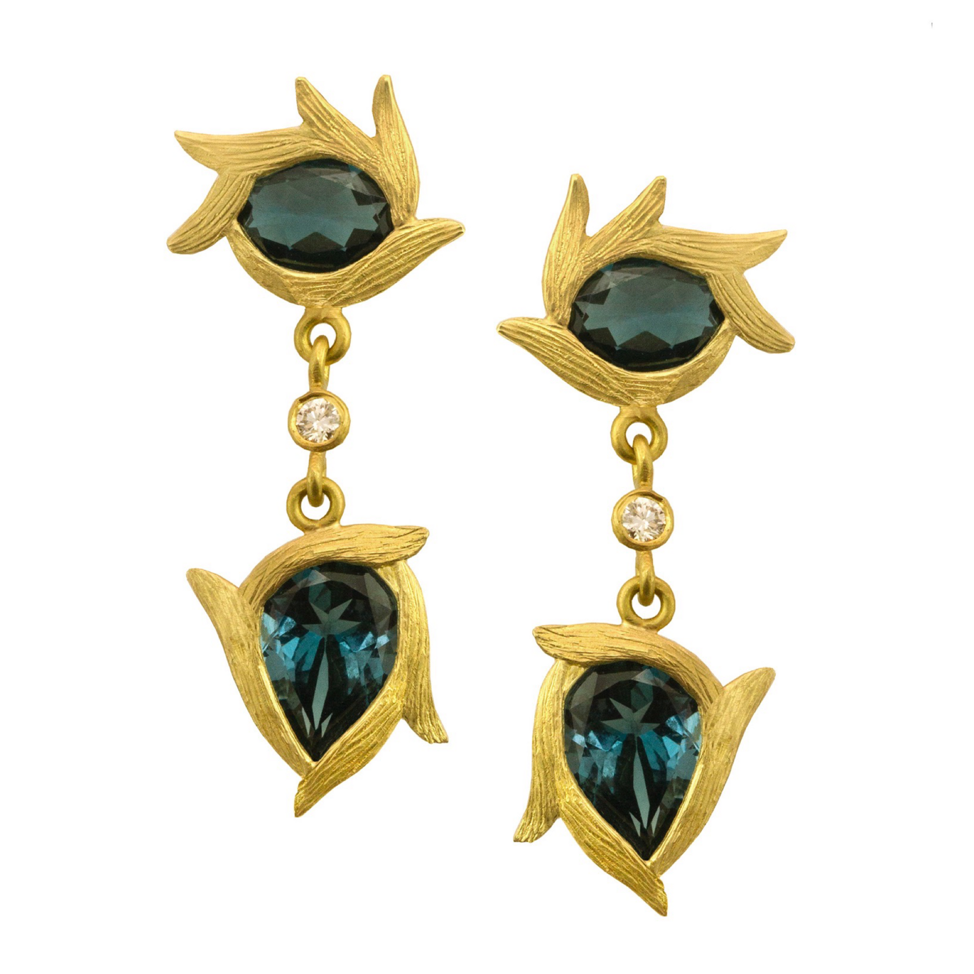 London Blue Topaz Vine Double Drop Earrings Laurie Kaiser available at Talisman Collection Fine Jewelers in El Dorado Hills, CA and online. The London Blue Topaz Vine Double Drop Earrings feature deeply colored London blue topaz stones set in 18k yellow gold and are accented with .06 cts of white diamonds. With an artistic interpretation of nature, these earrings are a fun and elegant look.