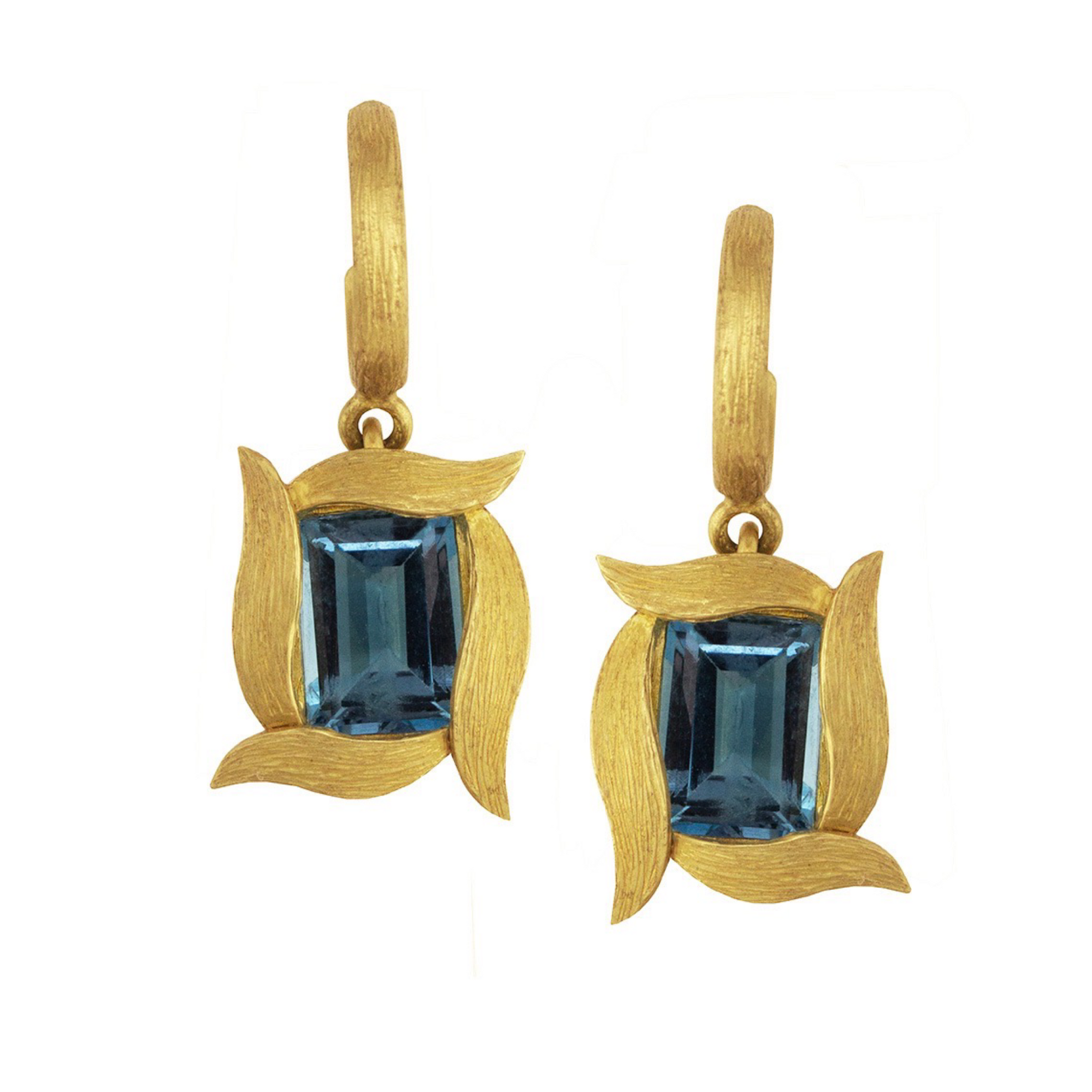 Blue Topaz Vine Hoop & Drop Earrings Laurie Kaiser available at Talisman Collection Fine Jewelers in El Dorado Hills, CA and online. Emerald cut London blue topaz stones framed by 18k yellow gold vines. The elegant and understated design adds a touch of sophistication to any look, while the small hoop makes them comfortable to wear all day.