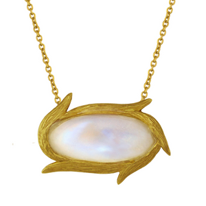 Vine Oval Moonstone Necklace by Laurie Kaiser available at Talisman Collection Fine Jewelers in El Dorado Hills, CA and online. The 18k yellow gold vines wrap elegantly around the gem, creating an organic frame. With a 19" chain, this necklace can be worn on its own or layered with other favorite pieces.